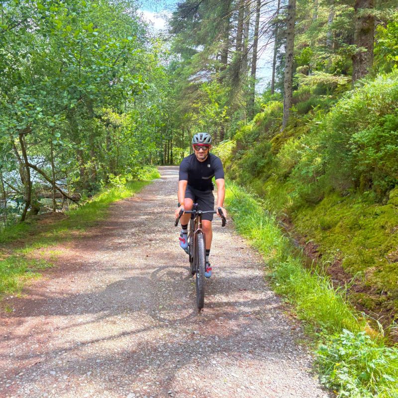 Male gravel riding in Scotland on a cycling tour